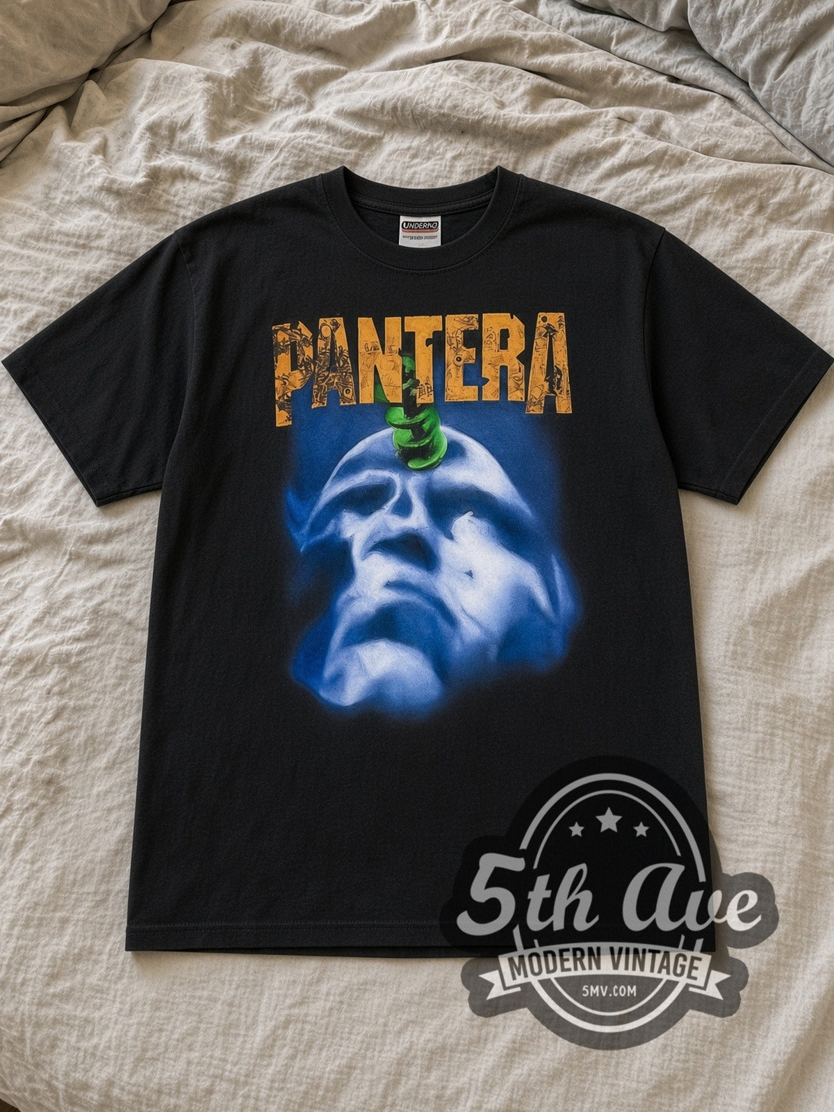 Black Pantera Far Beyond Driven Tour 1994 Vintage Band T-Shirt laid flat on a linen bed
