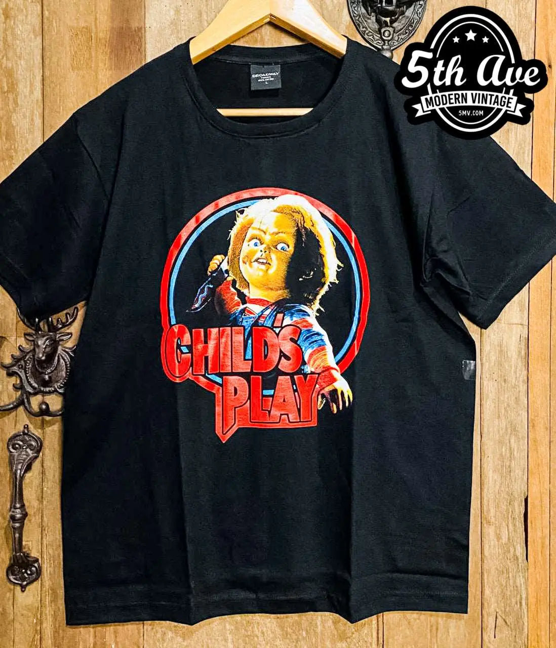Chucky's Menacing Embrace t shirt: Unleash the Terror vintage band t-shirt on rack