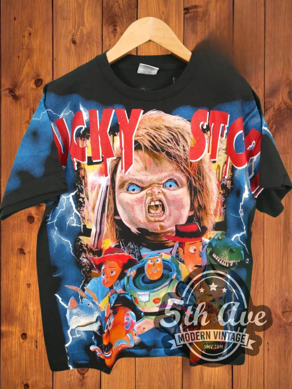 Chucky Story all-over-print vintage graphic t-shirt, front view on a display rack