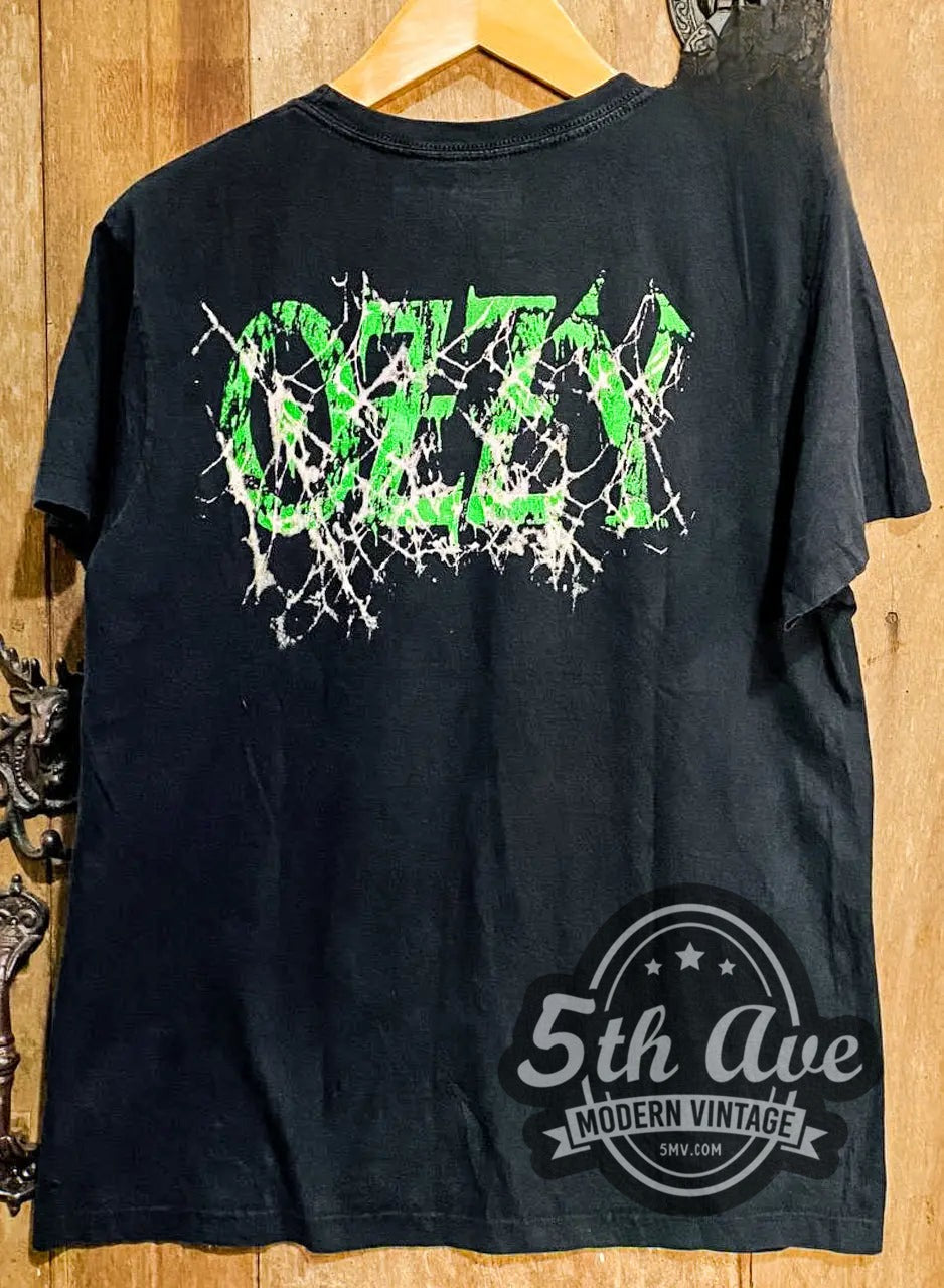 Ozzy Osbourne – Cobweb Logo vintage band t-shirt hanging on a hanger