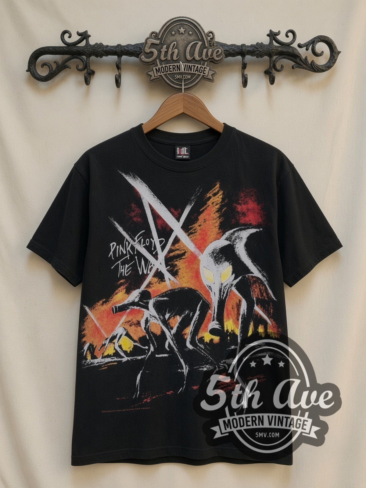 Pink Floyd The Wall Hammers all-over-print vintage band t-shirt in black, front view on a display rack