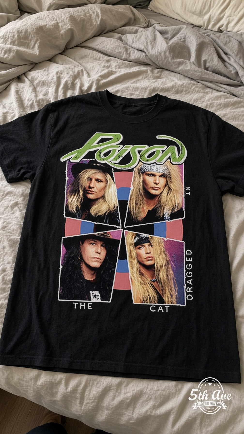 Poison Look What the Cat Dragged In vintage t-shirt laid on bed