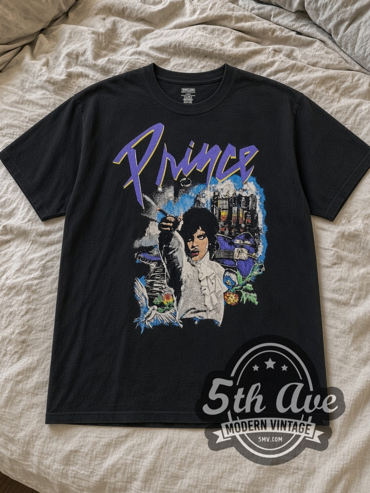 Black Prince and the Revolution Vintage Band T-Shirt laid flat on a linen bed