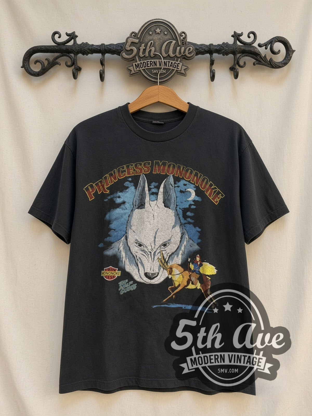 Princess Mononoke Wolf Gods / Shishi vintage anime t-shirt, front view on a display rack