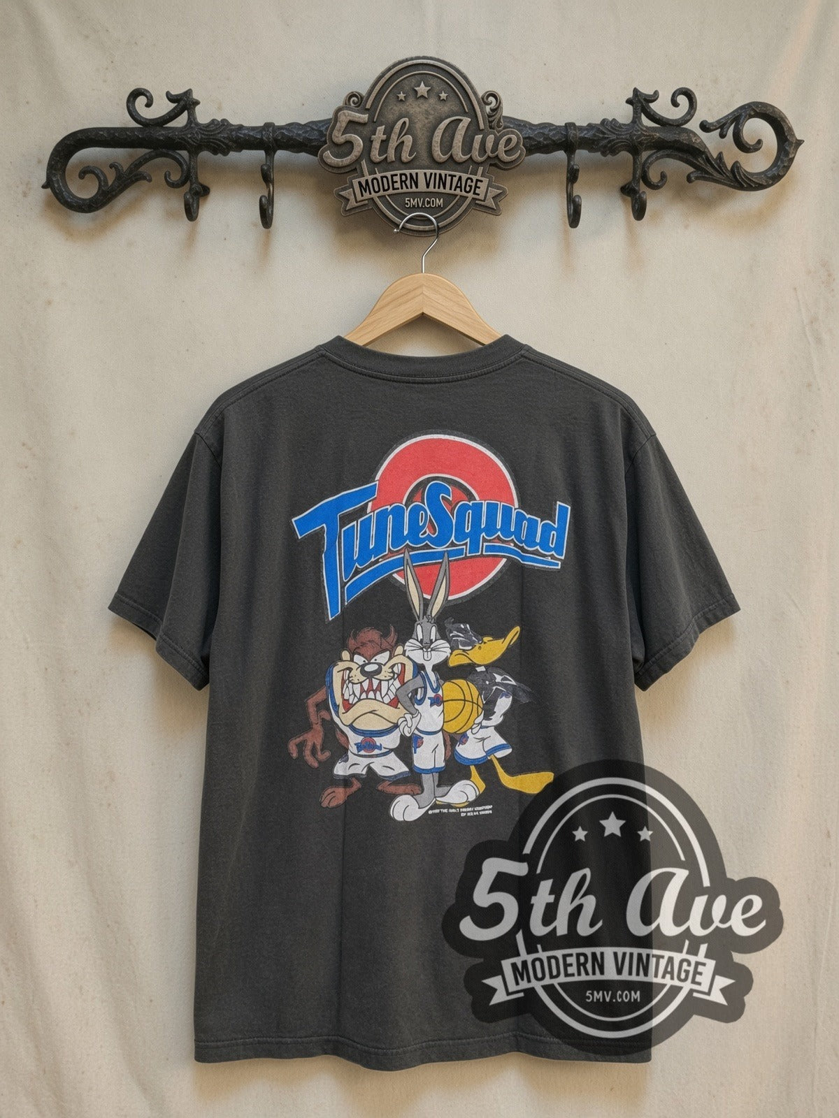 Looney Tunes TuneSquad vintage cartoon tee, back view on a display rack