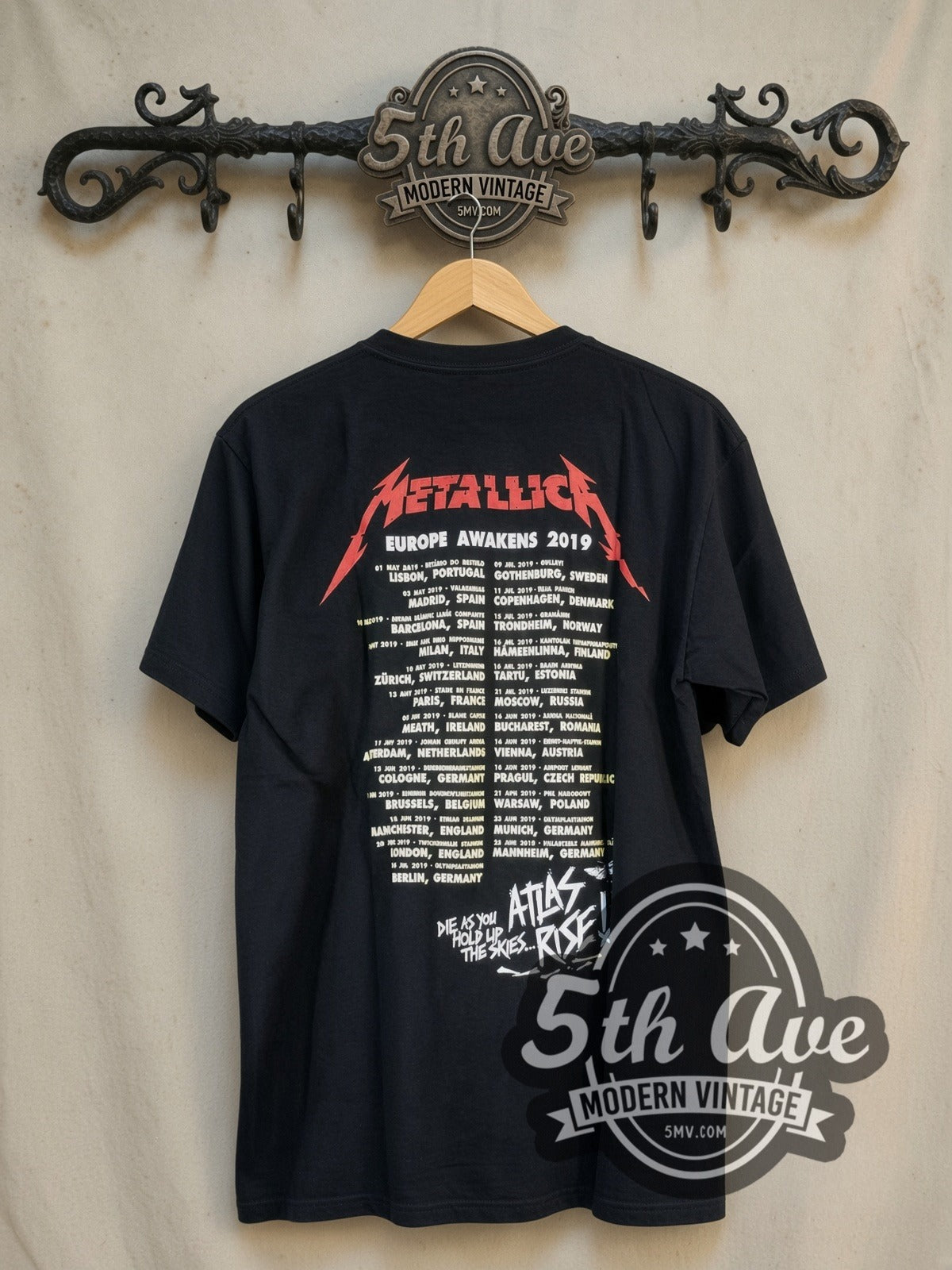 Metallica Atlas, Rise! vintage band t-shirt, back view on a display rack