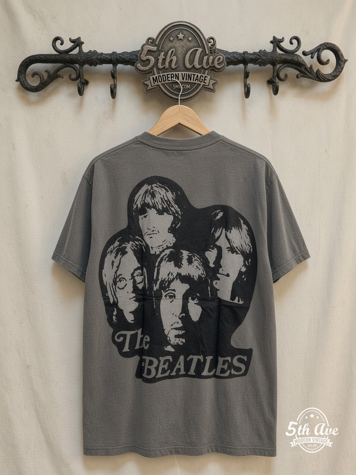 The Beatles – Union Jack Red Logo White Tee – Vintage Band T-Shirt — back on locked cream ornate 5th Ave rack