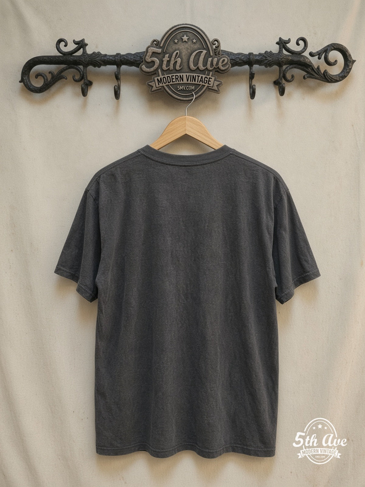 Iron Maiden – World Slavery Tour – Vintage Band T-Shirt — back on locked cream ornate 5th Ave rack