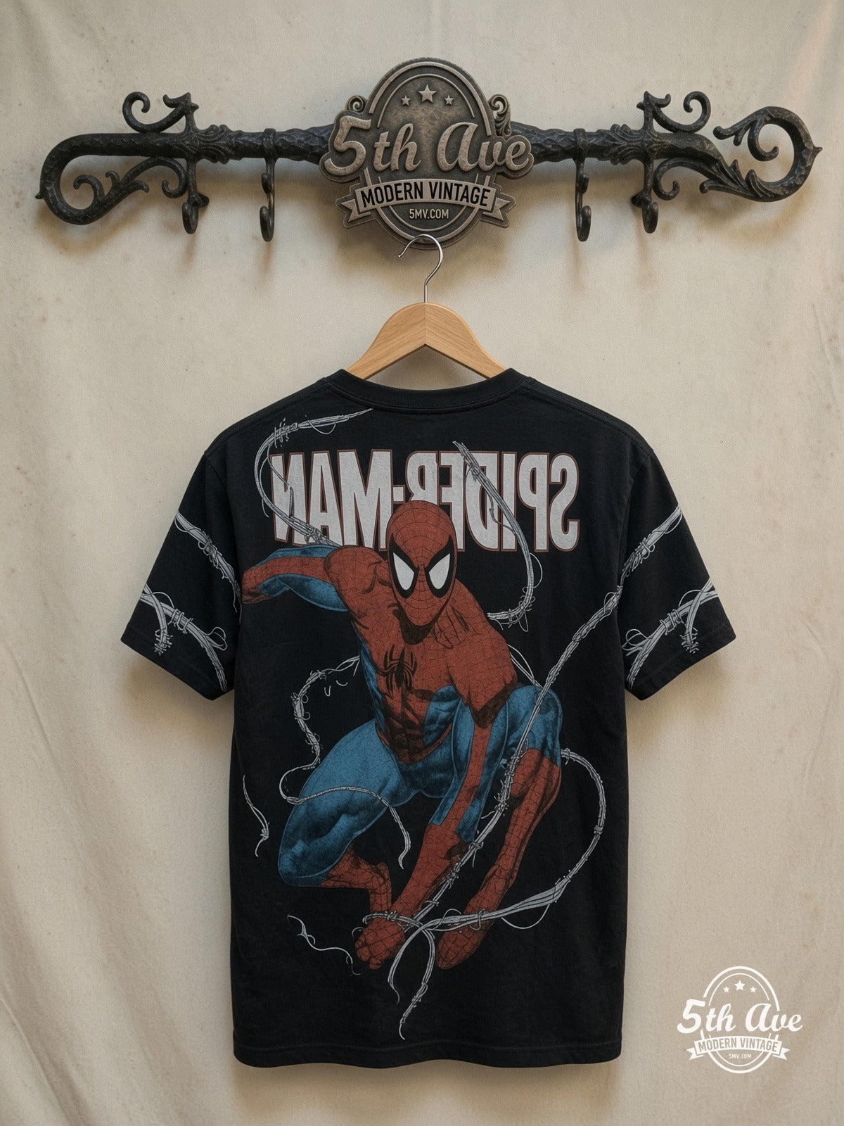 Spiderman all over Print T-Shirt — back on locked cream ornate 5th Ave rack