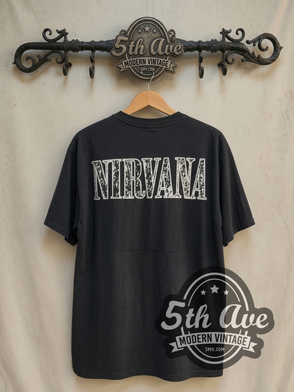 Nirvana In Utero Gold Cross vintage band t-shirt in black, back view on a display rack