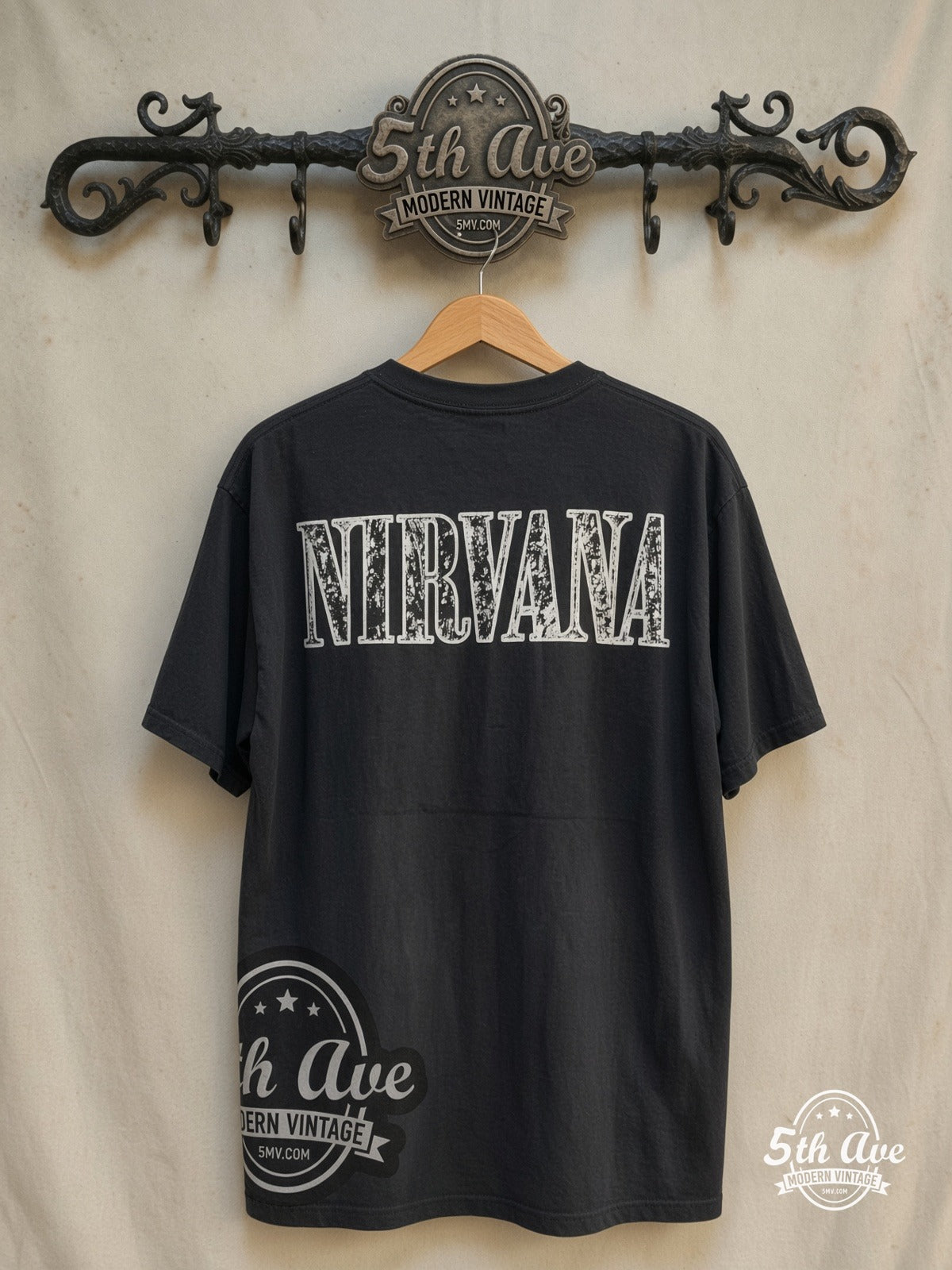 Nirvana – In Utero Gold Cross – Vintage Band T-Shirt — back on locked cream ornate 5th Ave rack