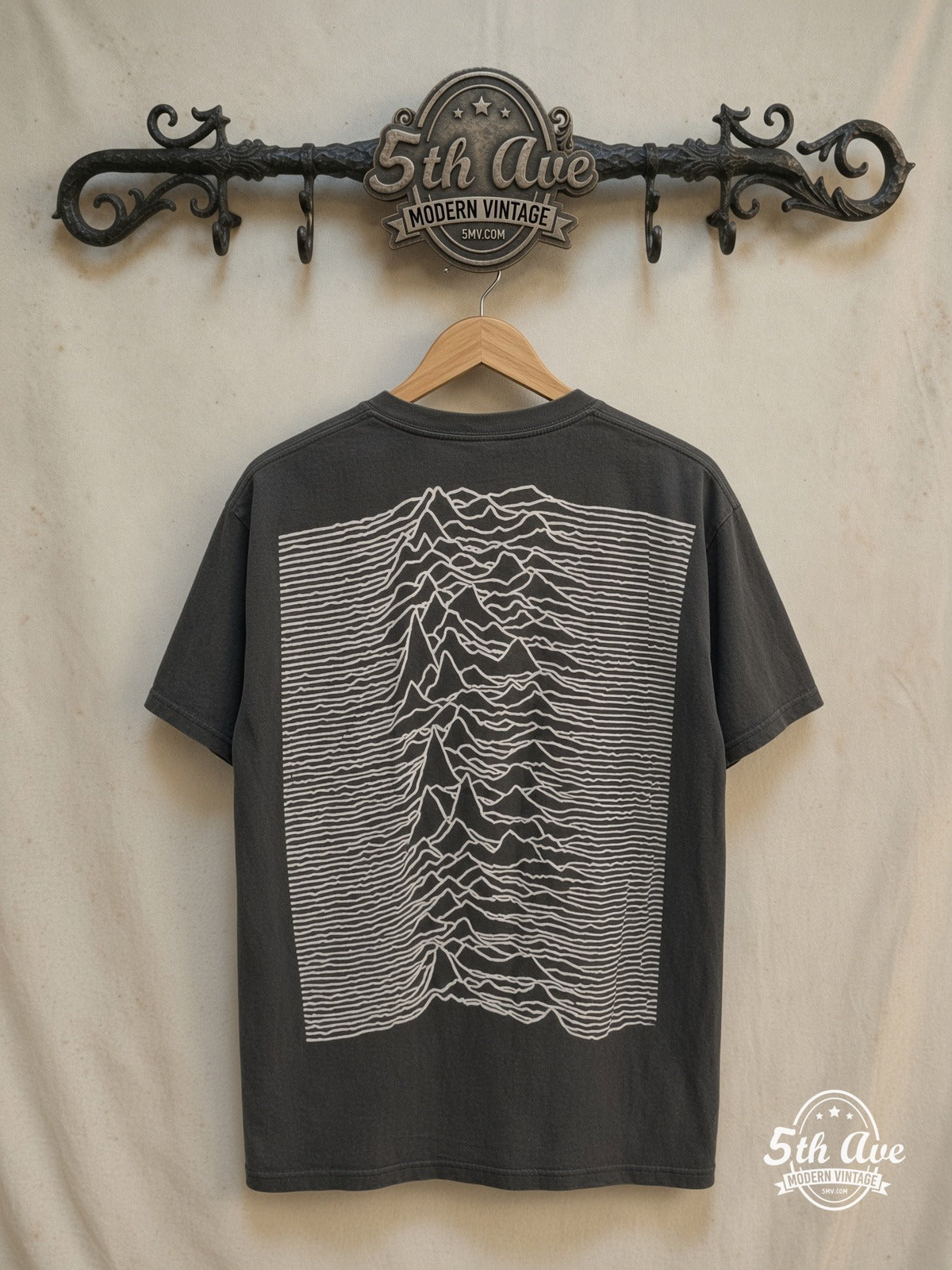 Joy Division – Unknown Pleasures Love Will Tear Us Apart – Vintage Band T-Shirt — back on locked cream ornate 5th Ave rack