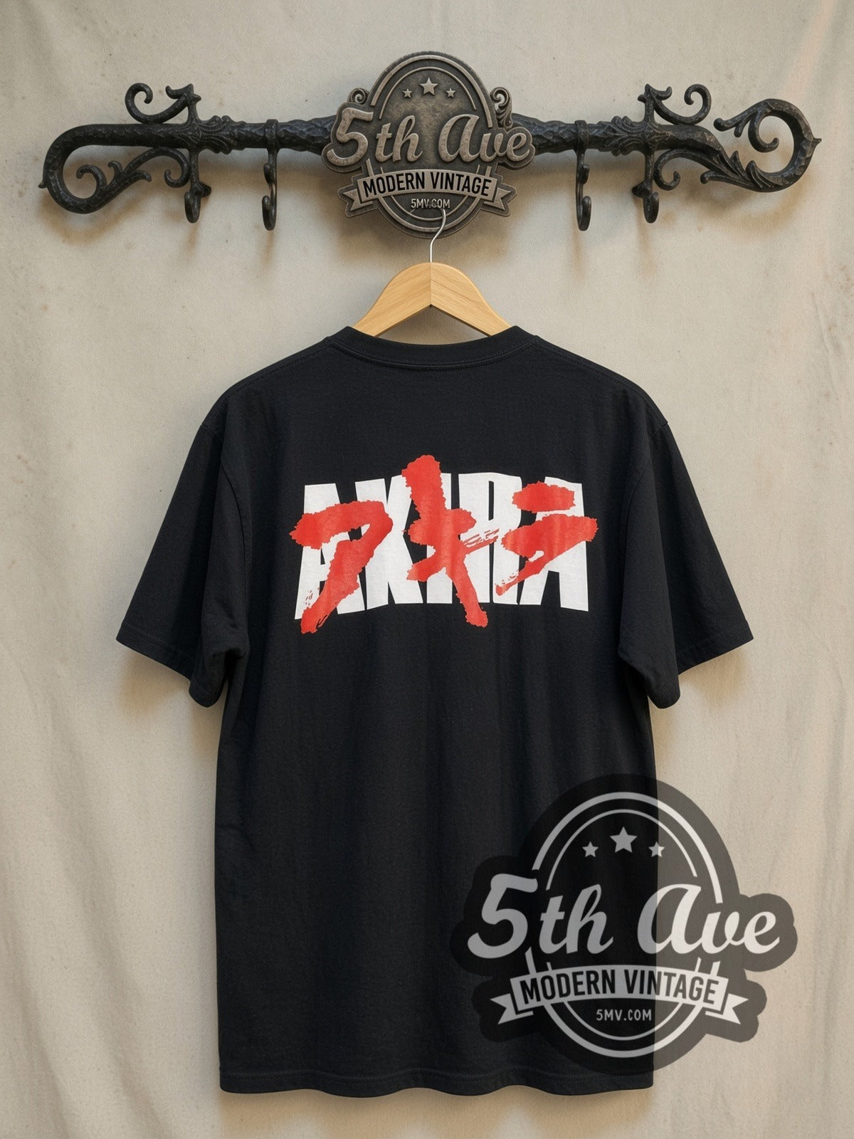 Akira Kaneda Neo-Tokyo Logo vintage graphic t-shirt, back view on a display rack