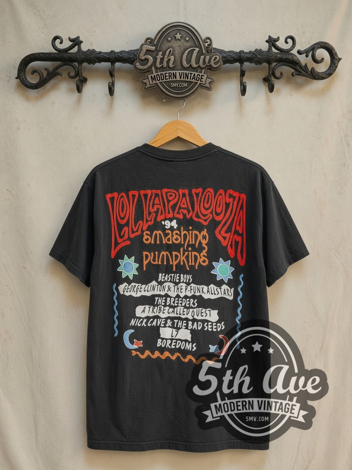 The Smashing Pumpkins Lollapalooza Tour 1994 vintage band t-shirt in black, back view on a display rack