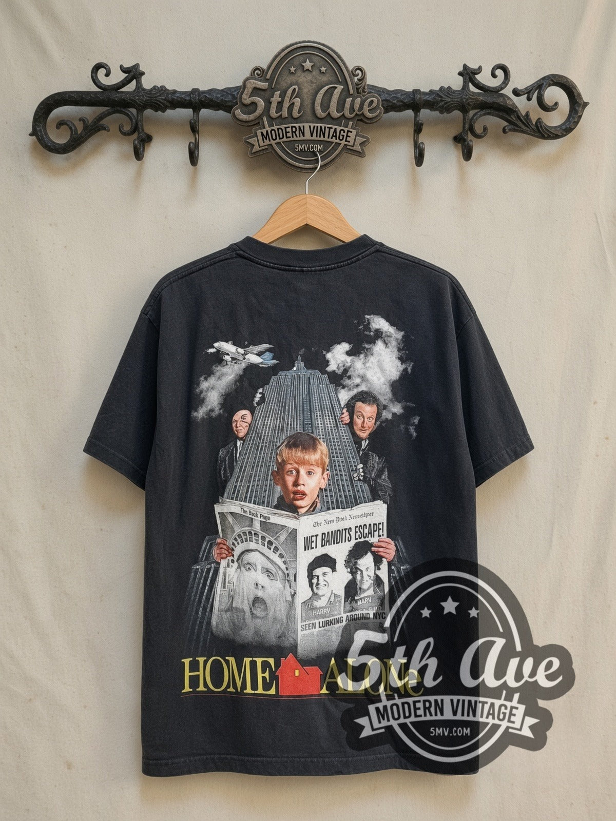 Home Alone vintage graphic t-shirt, back view on a display rack