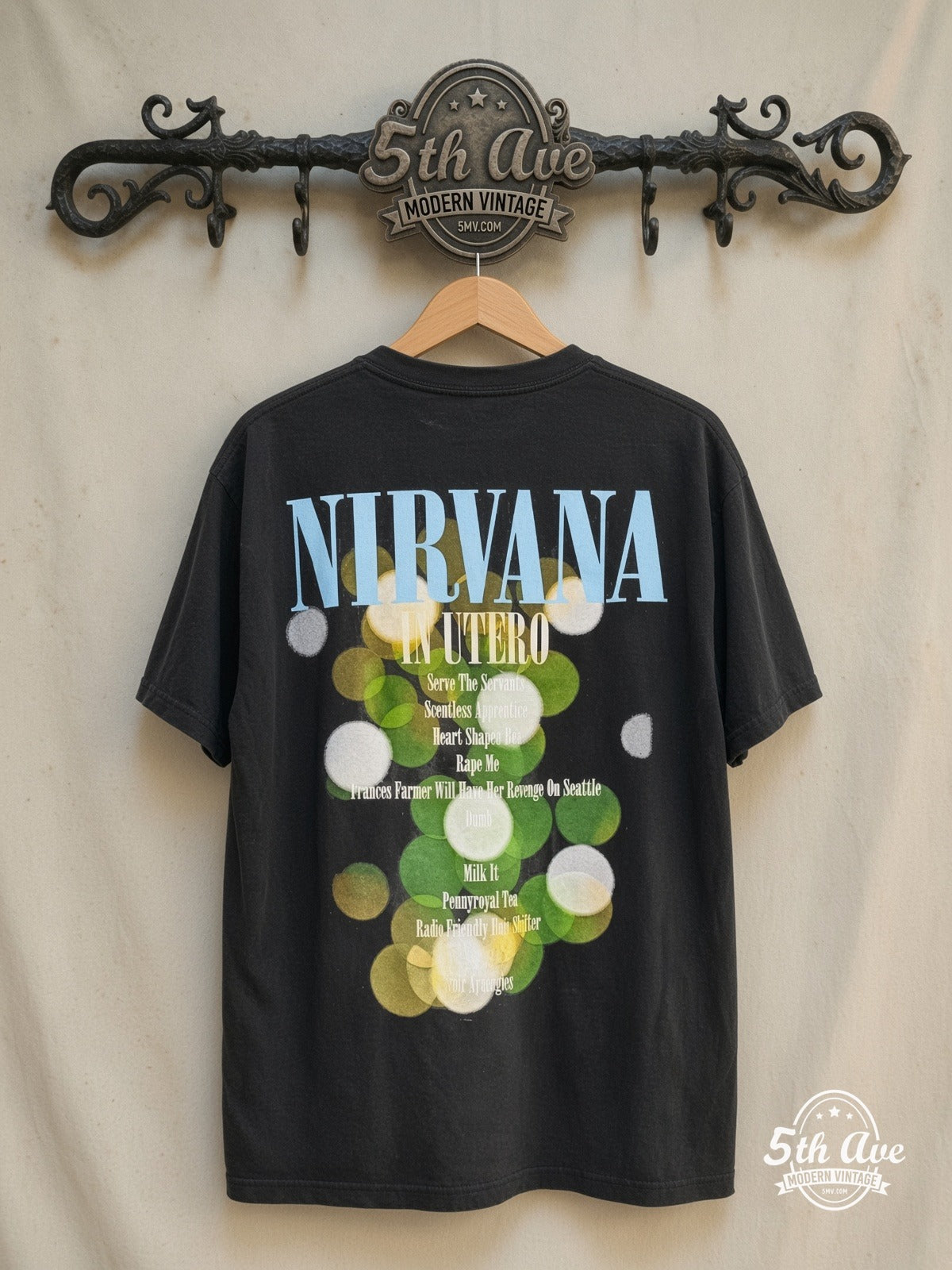 Nirvana – In Utero Angel Aura – Vintage Band T-Shirt — back on locked cream ornate 5th Ave rack