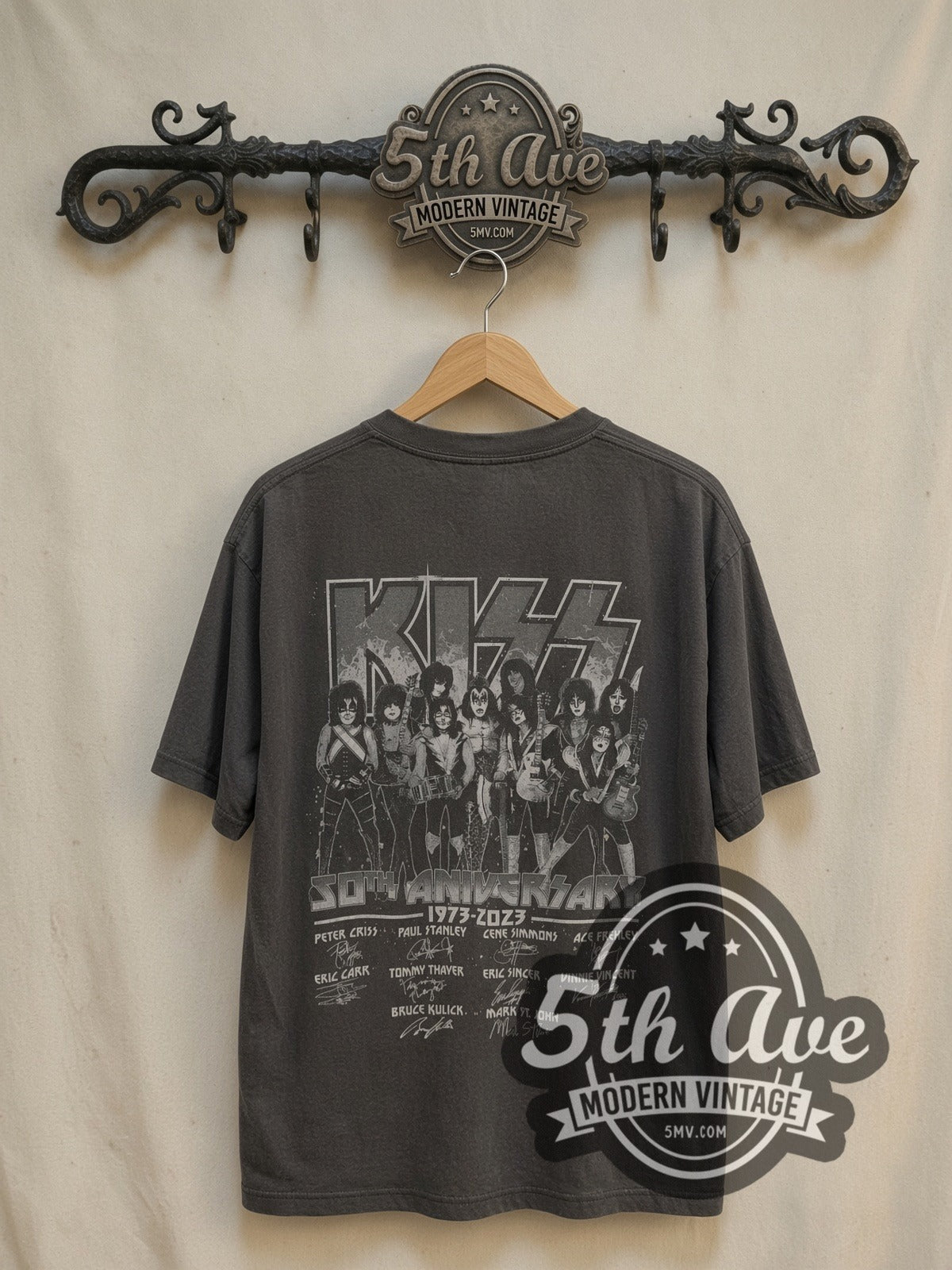 KISS 50th Anniversary vintage band t-shirt, back view on a display rack