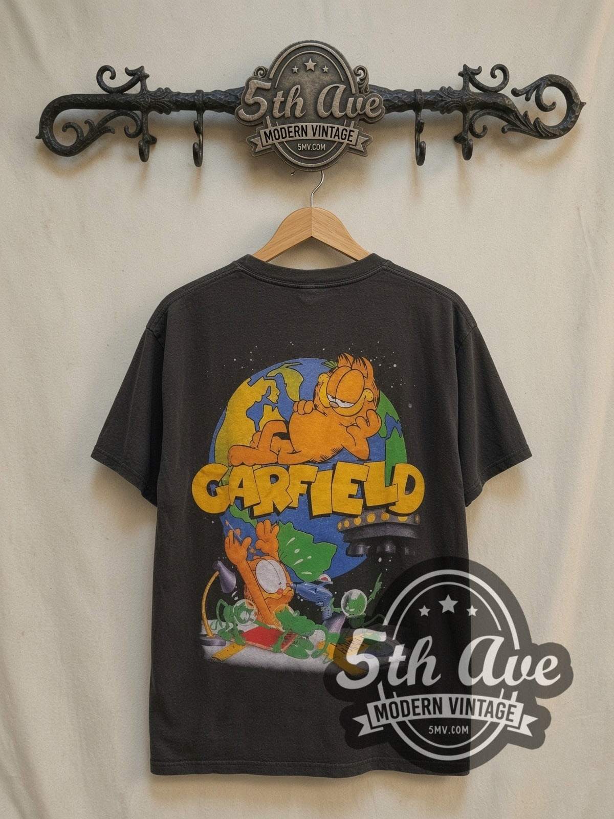 Garfield Aliens UFO vintage cartoon tee, back view on a display rack
