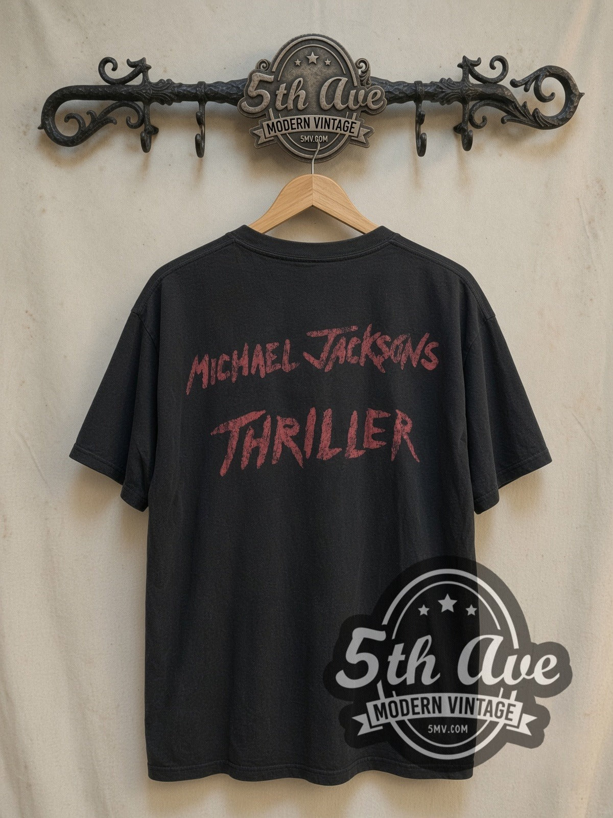 Michael Jackson Thriller vintage band t-shirt, back view on a display rack