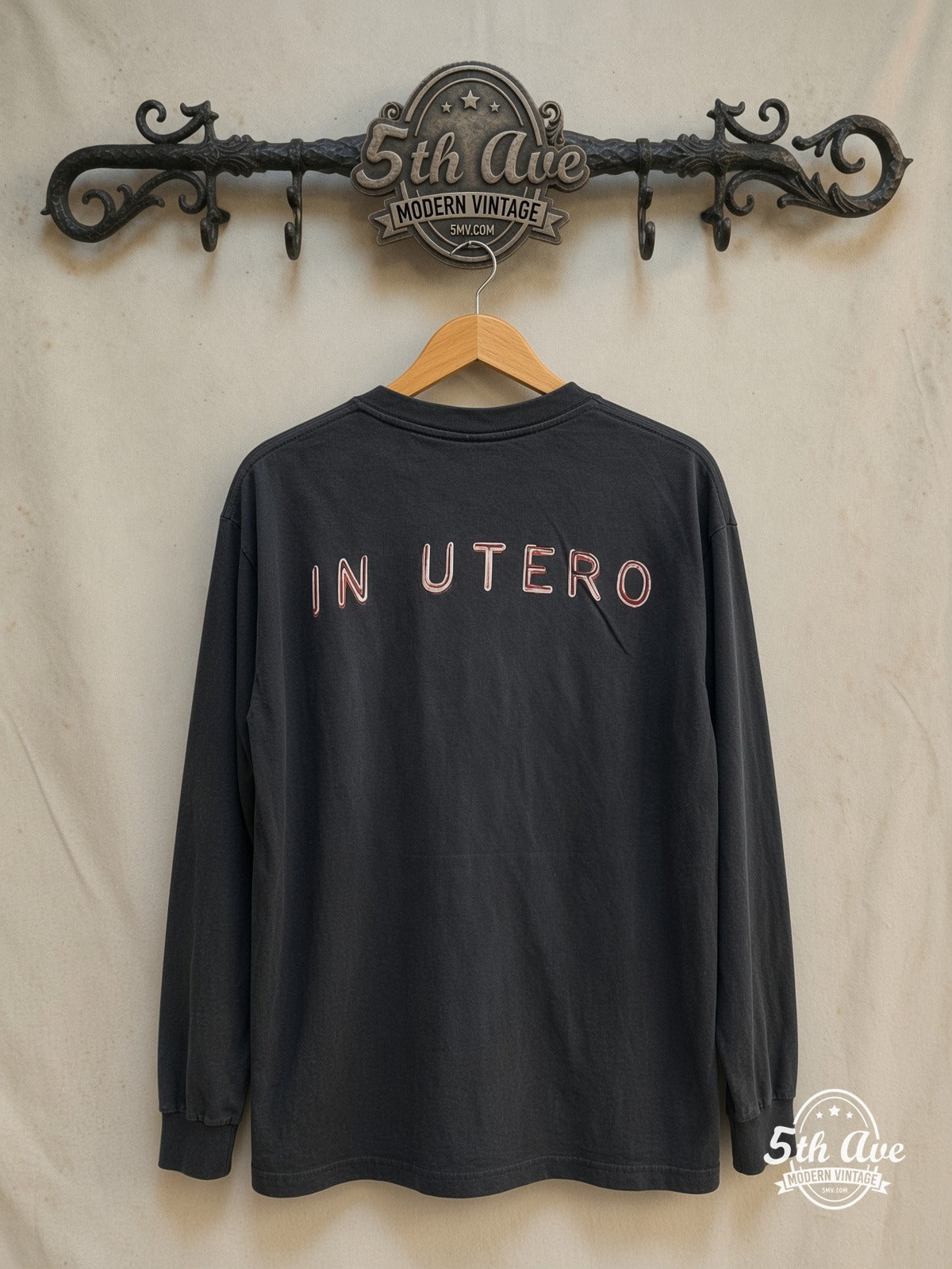Nirvana – In Utero Red Logo Angel Long Sleeve – Vintage Band T-Shirt — back on locked cream ornate 5th Ave rack