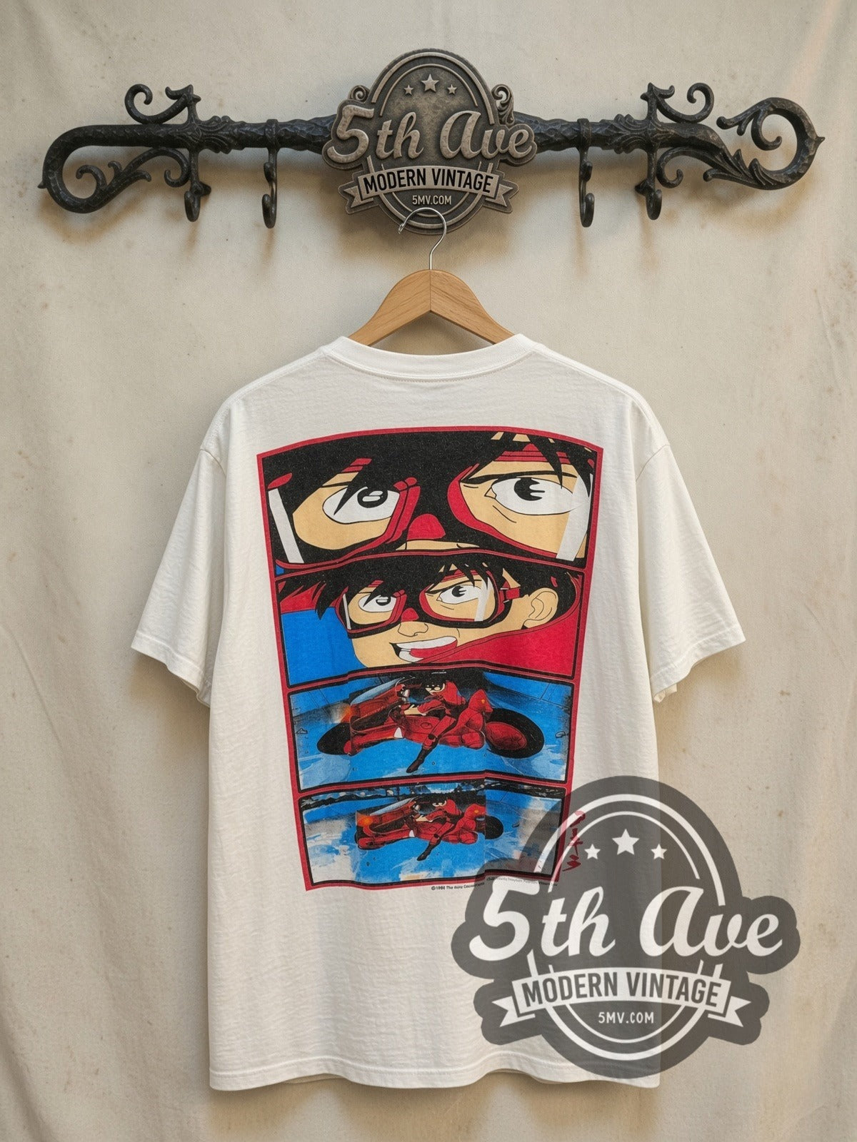 Akira Kaneda Motorcycle vintage graphic t-shirt in white, back view on a display rack