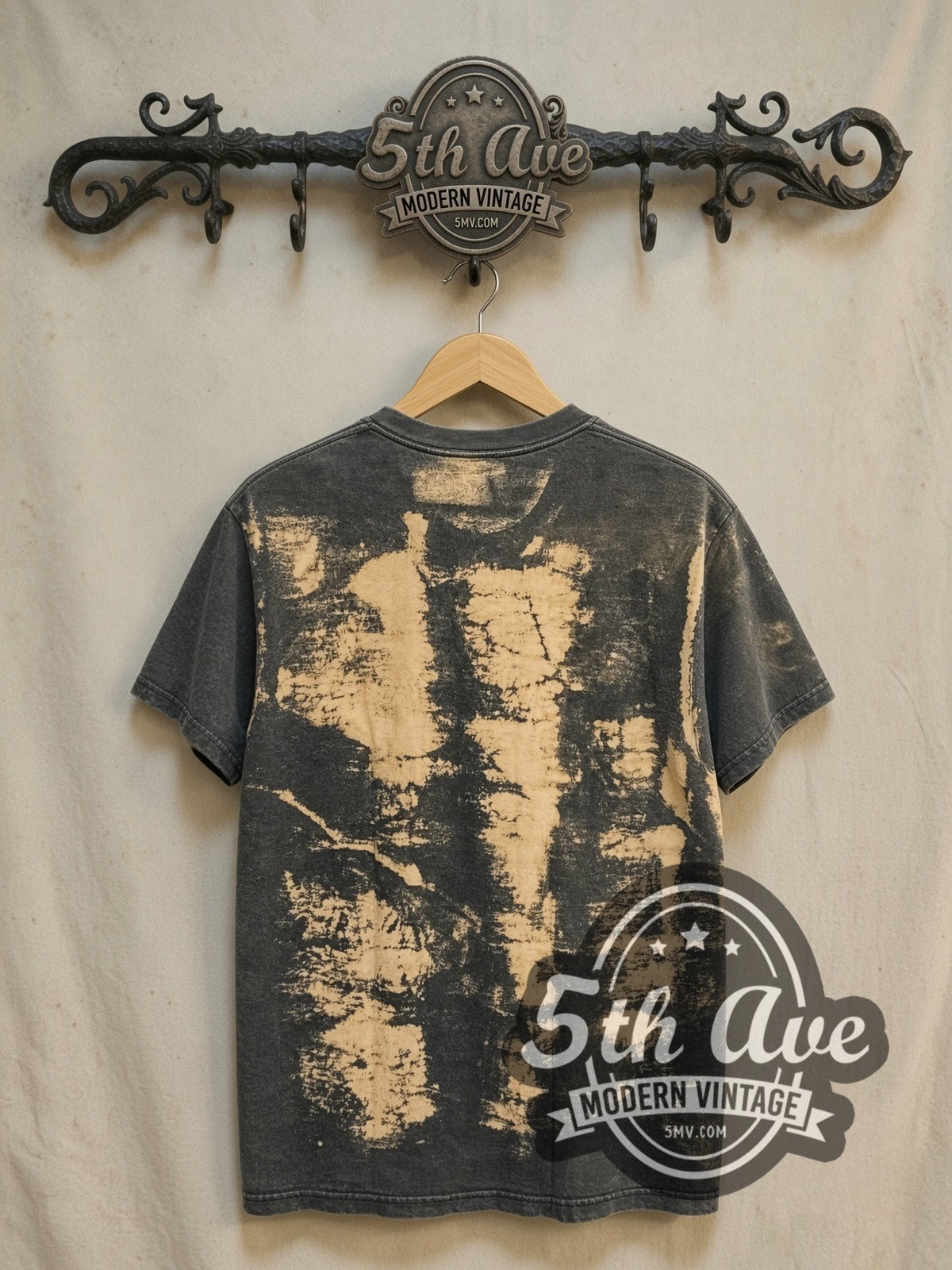 Marilyn Monroe all-over-print vintage movie tee, back view on a display rack