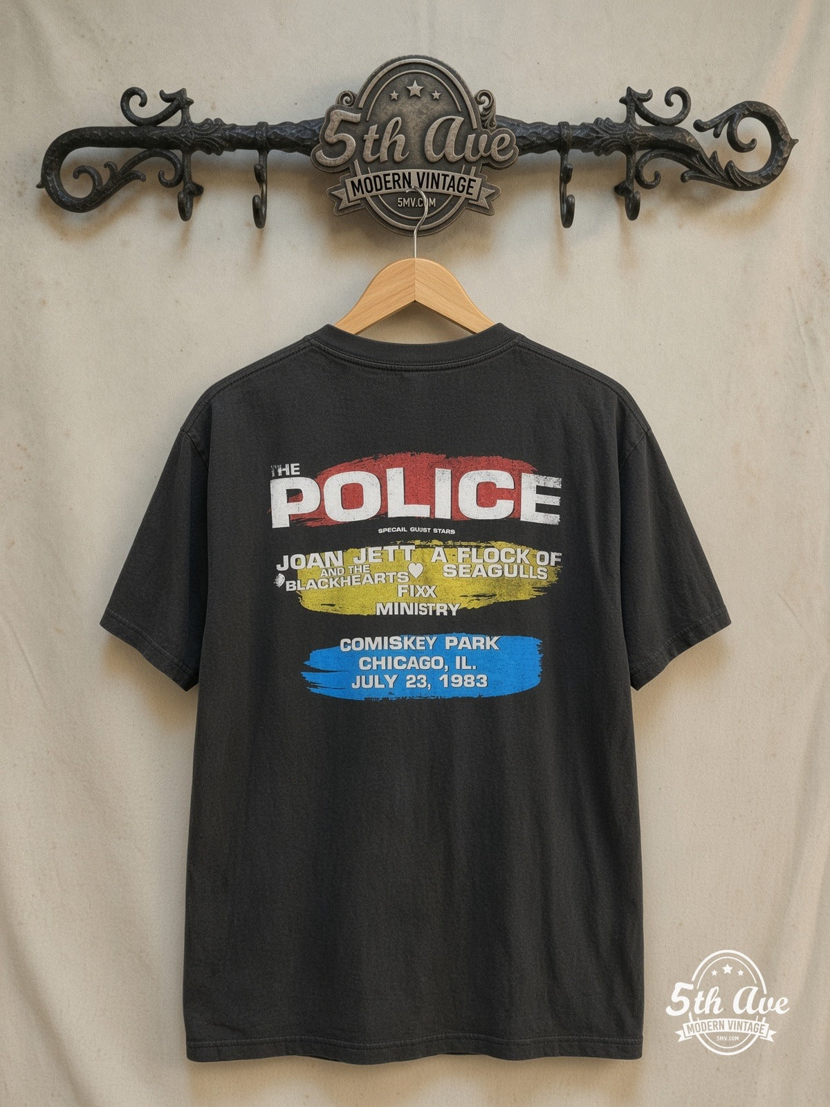The Police – North American Tour 1983 – Vintage Band T-Shirt — back on locked cream ornate 5th Ave rack