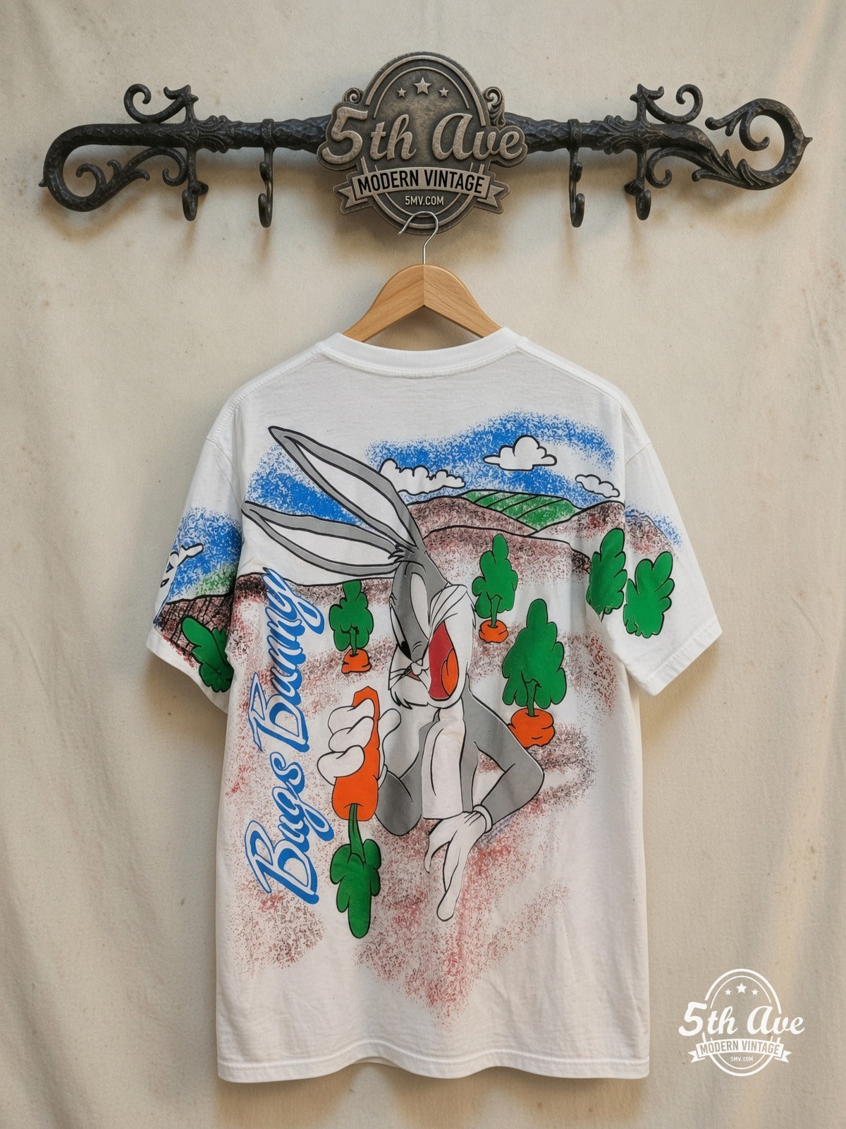 Bugs Bunny – Bugs Bunny – All Over Print – New Vintage Graphic Tee — back on locked cream ornate 5th Ave rack