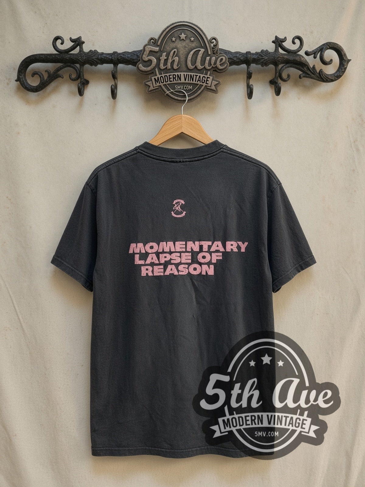 Pink Floyd A Momentary Lapse of Reason vintage band t-shirt in black, back view on a display rack