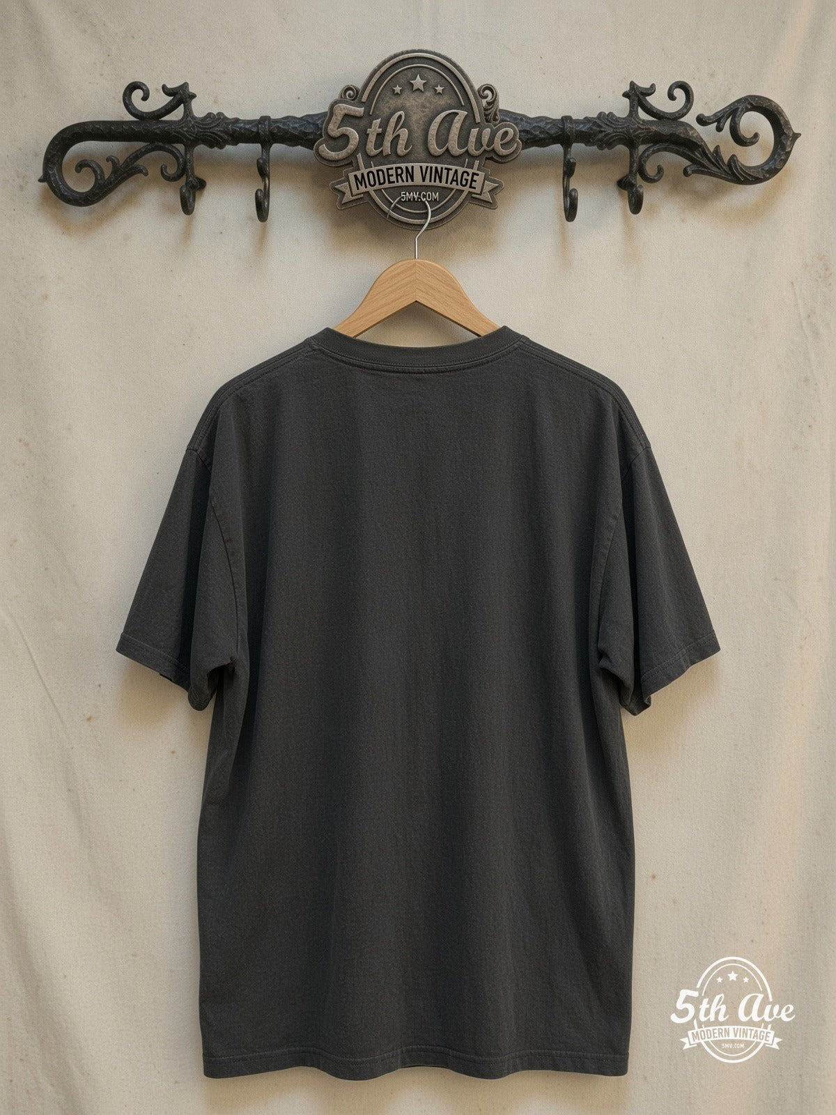 Eagles – Hotel California – Vintage Band T-Shirt — back on locked cream ornate 5th Ave rack