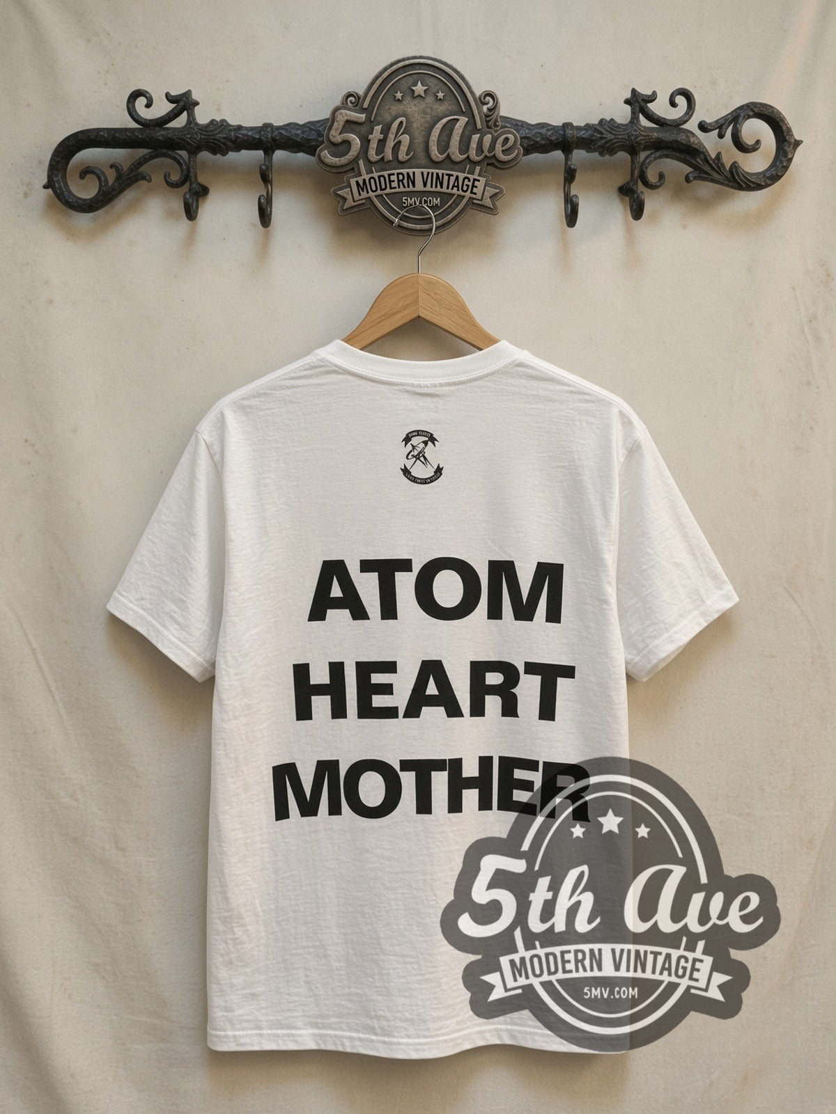 Pink Floyd Atom Heart Mother Cow Front vintage band t-shirt, back view on a display rack