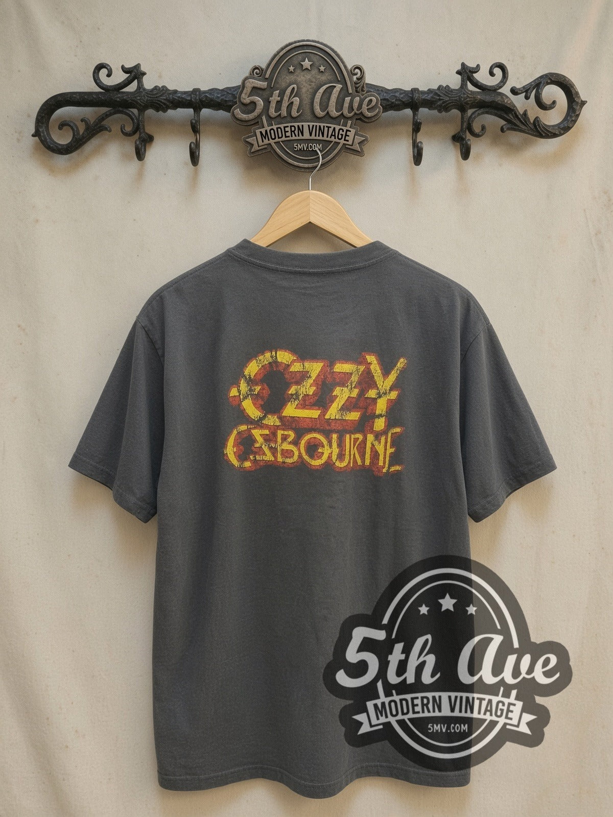 Ozzy Osbourne The Ultimate vintage band t-shirt, back view on a display rack