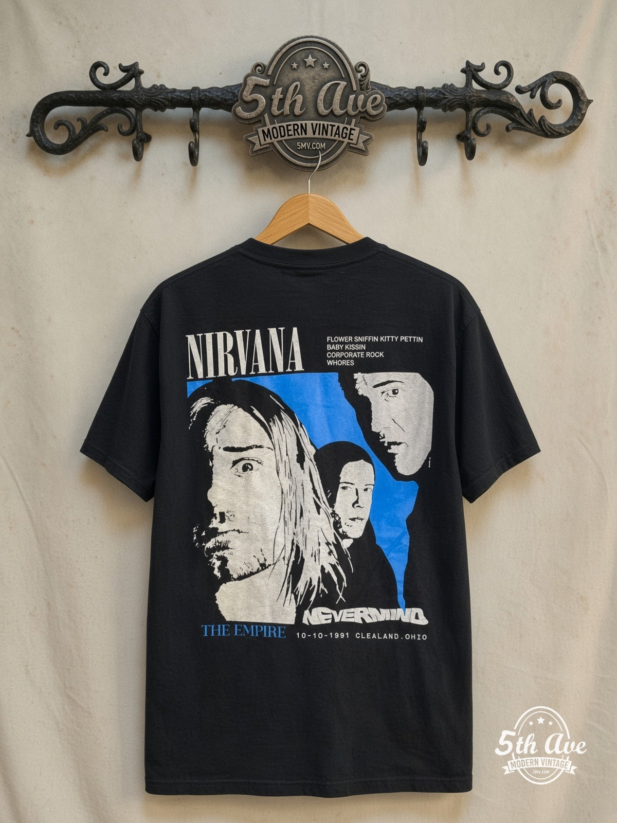 Nirvana – Kurt Cobain Filmstrip Red Logo Tribute – Vintage Band T-Shirt — back on locked cream ornate 5th Ave rack