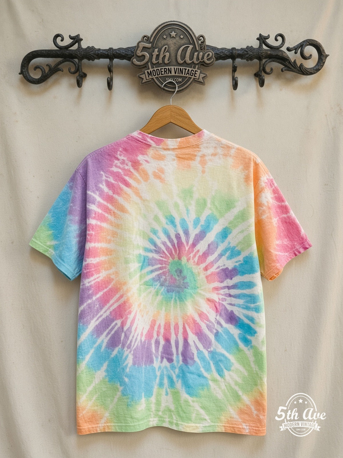Grateful Dead Spiral Bear Tie Dye vintage band t-shirt, back view on a display rack