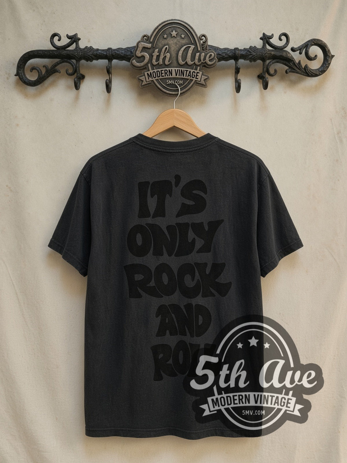 The Rolling Stones World Wide Tour 1978' It's Only Rock 'n Roll vintage band t-shirt in black, back view on a display rack