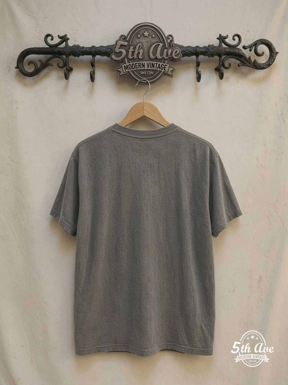 Nirvana – In Utero Classic Angel Dark Logo White – Vintage Band T-Shirt — back on locked cream ornate 5th Ave rack