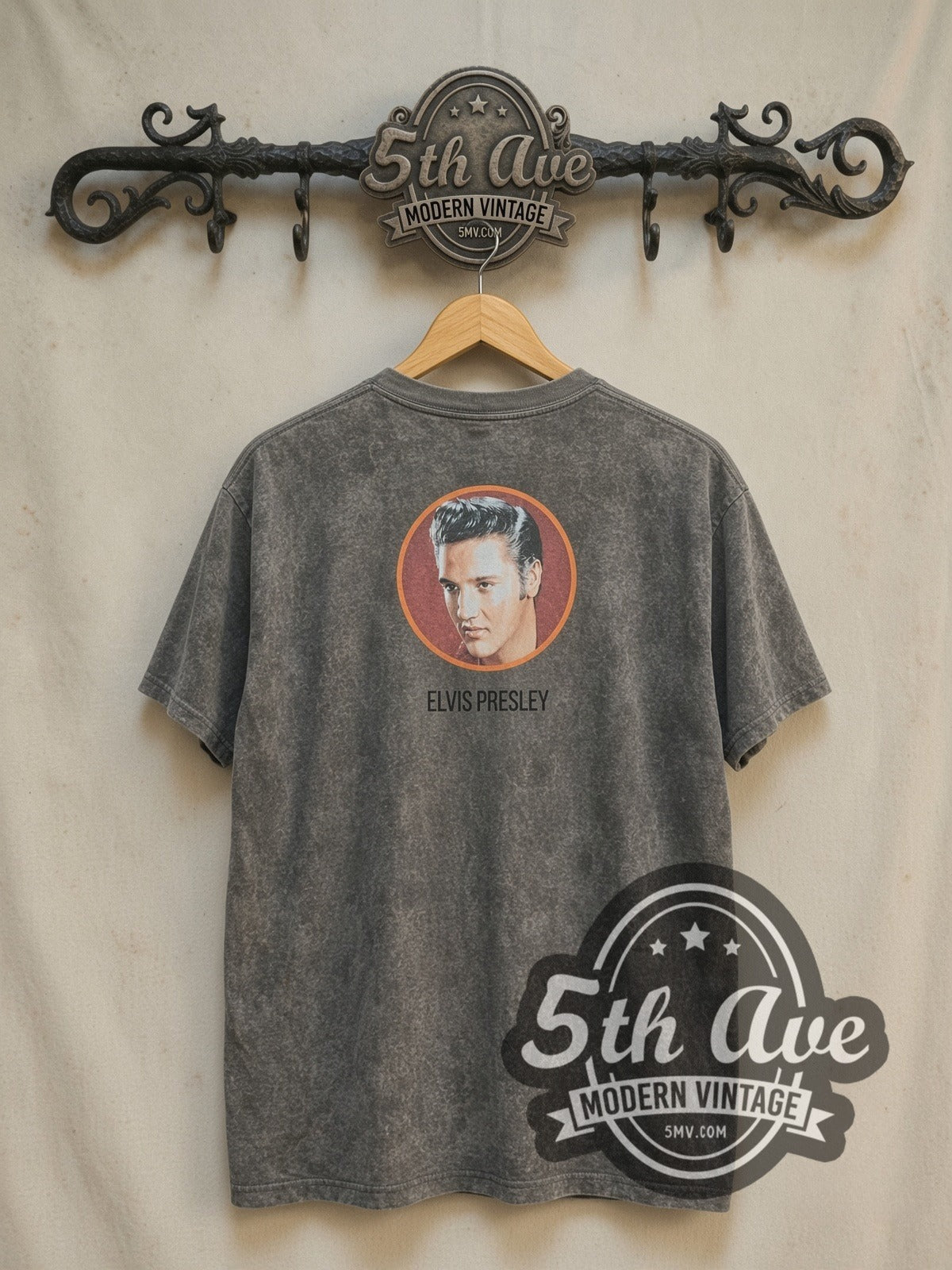 Elvis Presley King of Rock and Roll vintage band t-shirt, back view on a display rack