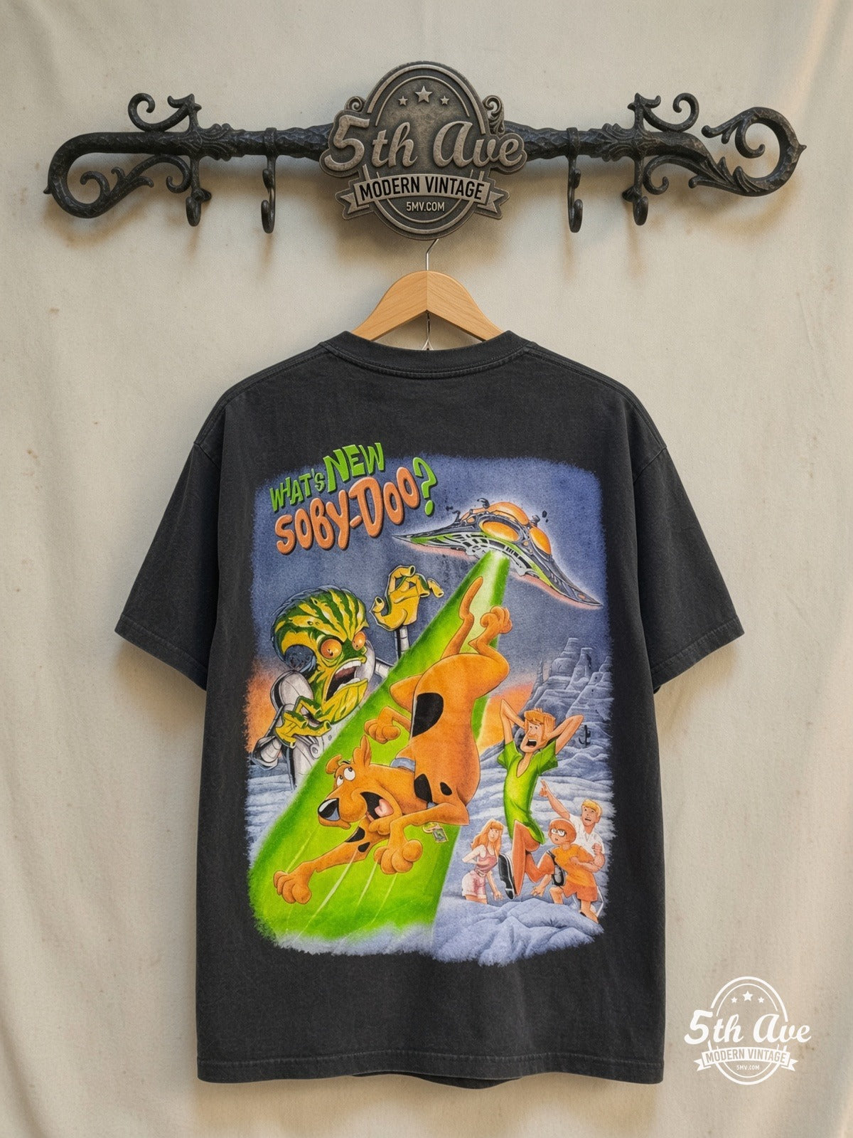 Scooby-Doo – Cyber Chase – All Over Print – New Vintage Graphic Tee — back on locked cream ornate 5th Ave rack
