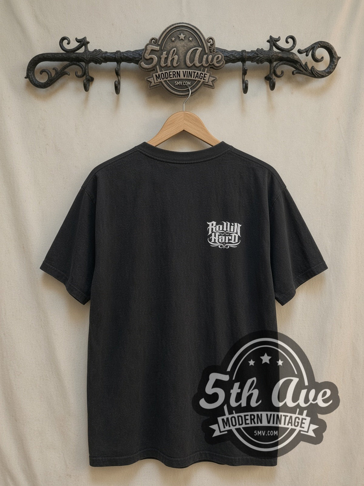 Rollin Hard Lowrider Dreams and Hydraulic Scenes vintage graphic tee, back view on a display rack