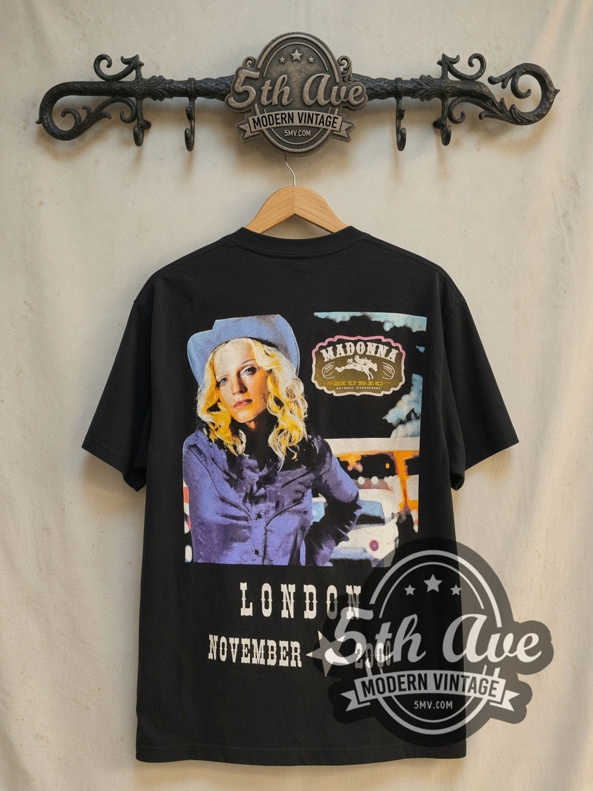 Madonna Brixton Academy Concert 2000 vintage band t-shirt in black, back view on a display rack
