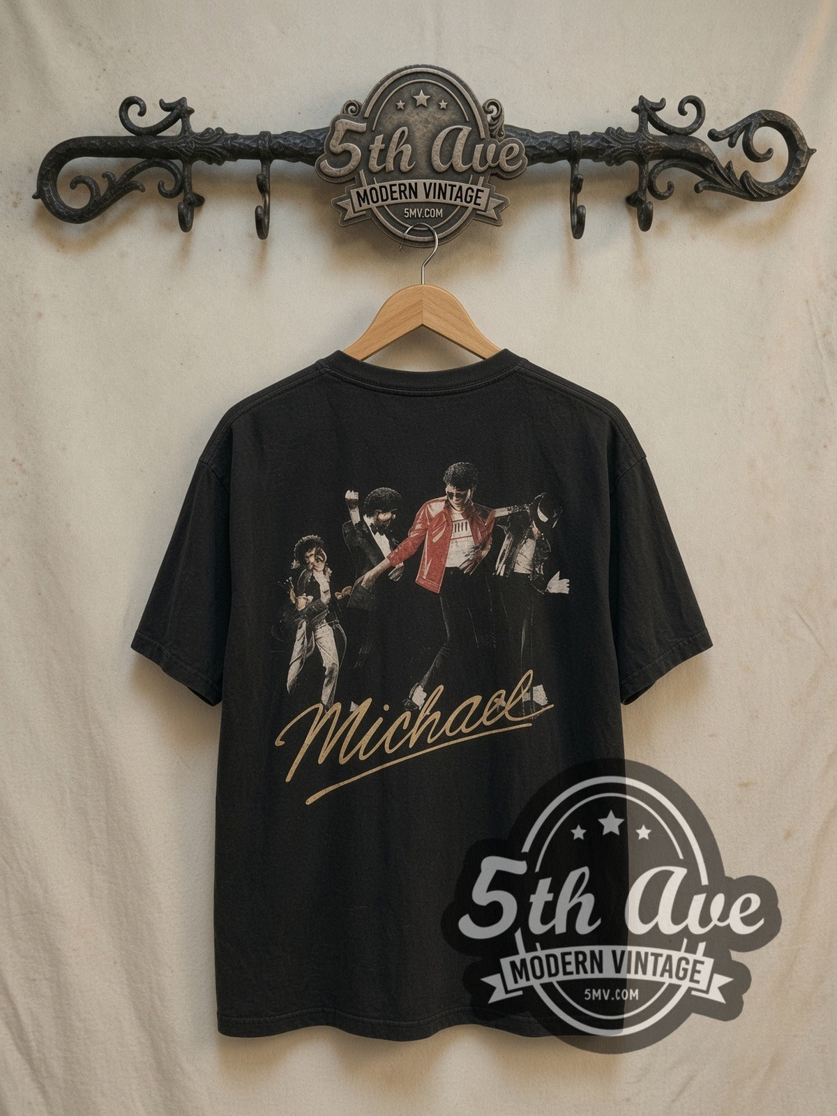 Michael Jackson Jaafar Jackson Red Jacket Script vintage band t-shirt, back view on a display rack