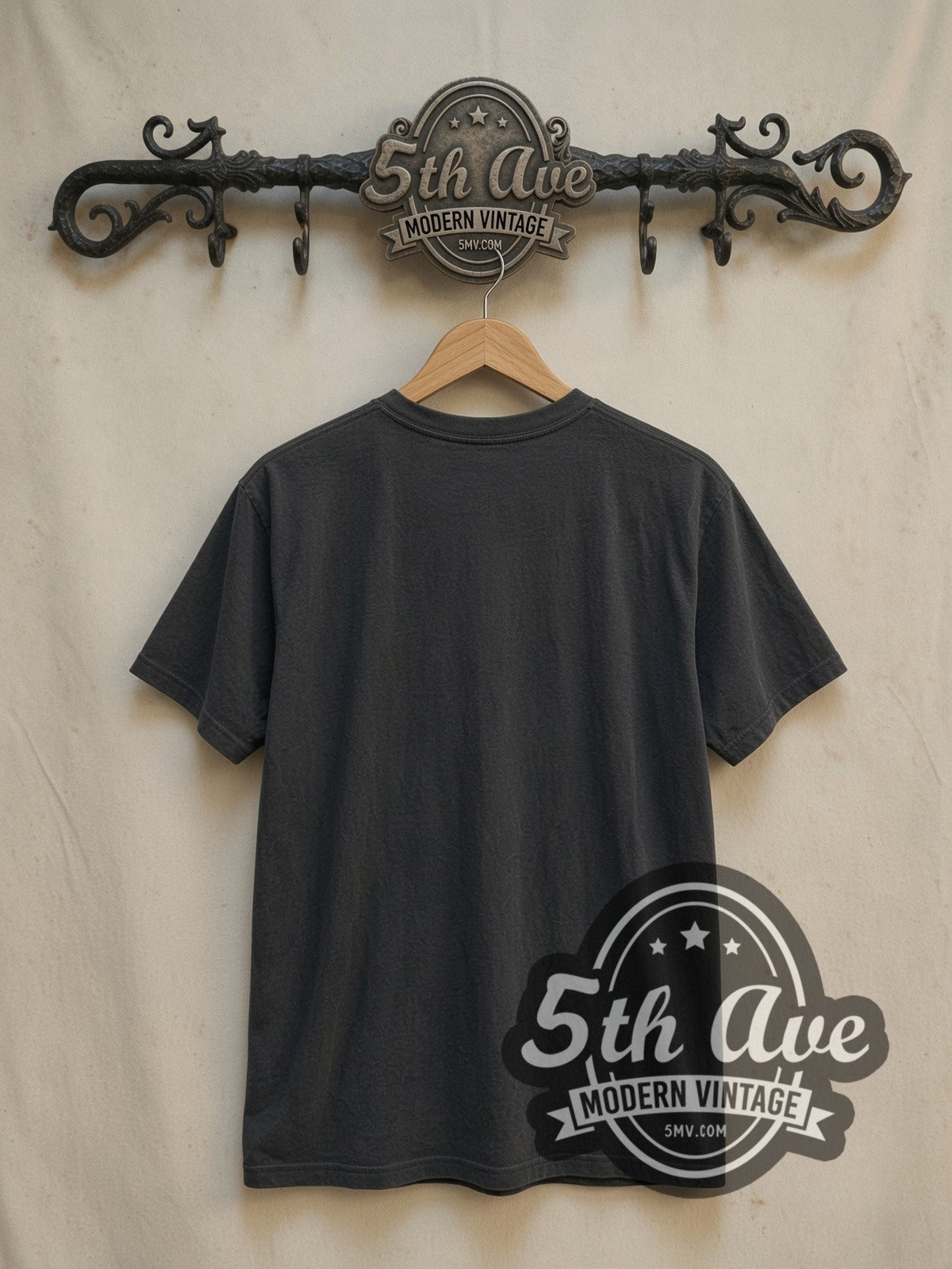 Joy Division Lead Singer Mic Stand vintage band t-shirt, back view on a display rack