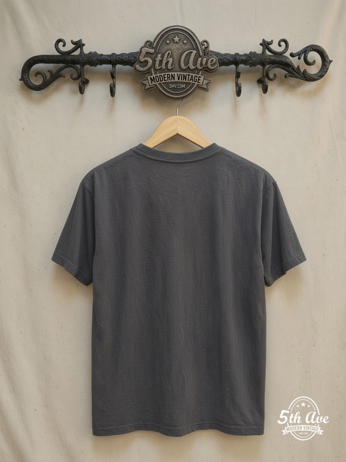 ANTHRAX 100% Cotton New Vintage Band T-Shirt – New Vintage Graphic Tee — back on locked cream ornate 5th Ave rack
