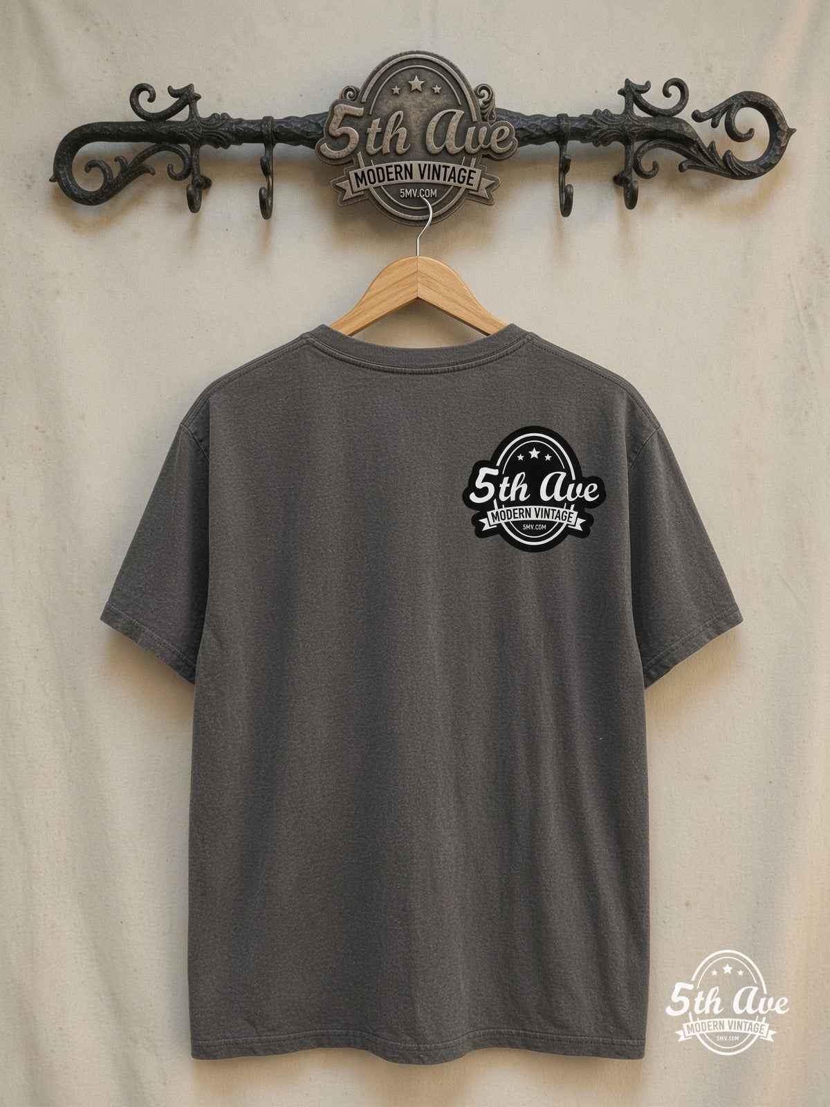 Oasis – Gallagher Brothers – Vintage Band T-Shirt — back on locked cream ornate 5th Ave rack