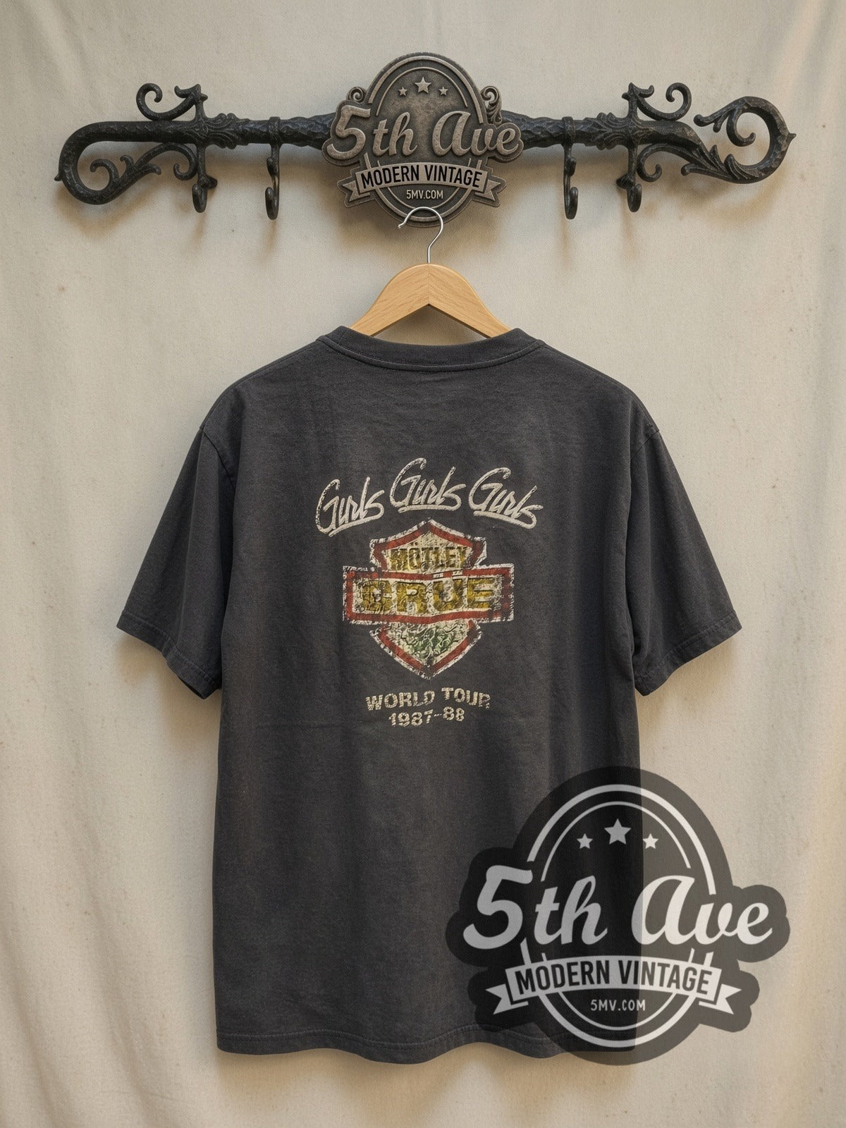 Mötley Crüe Girls Girls Girls Tour '87 vintage band t-shirt, back view on a display rack