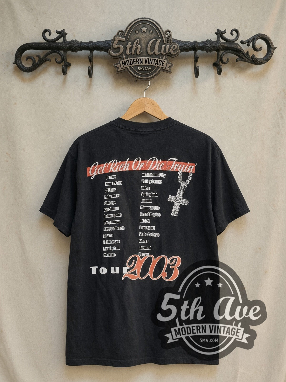 50 Cent Get Rich or Die Tryin' The Final Lap Tour 2003 vintage rap tee in black, back view on a display rack