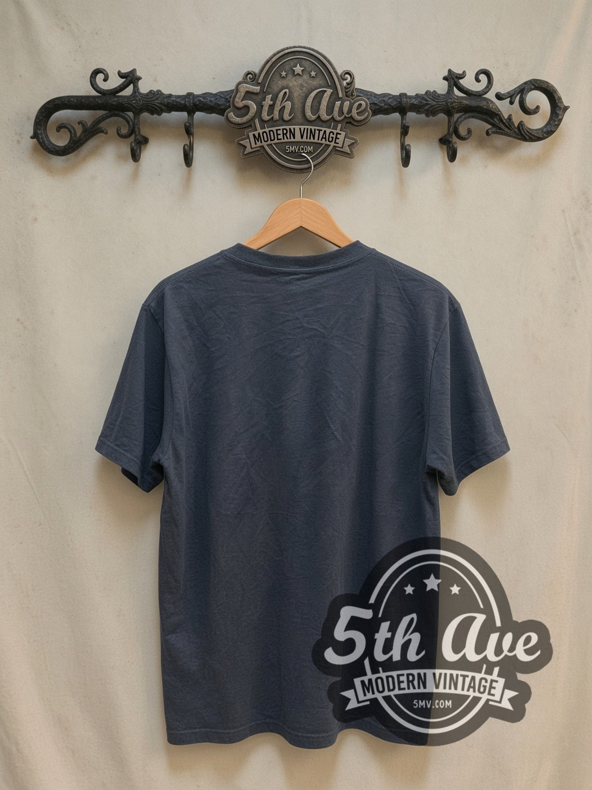 Joy Division Iconic vintage band t-shirt, back view on a display rack