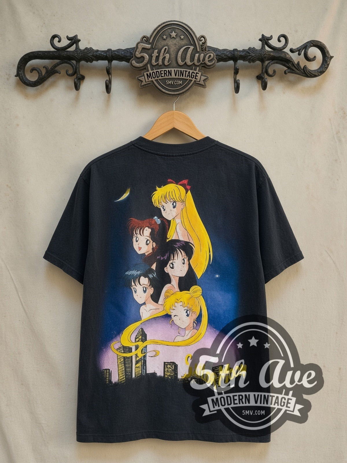 Sailor Moon Five Sailor Guardians Transform vintage graphic t-shirt, back view on a display rack