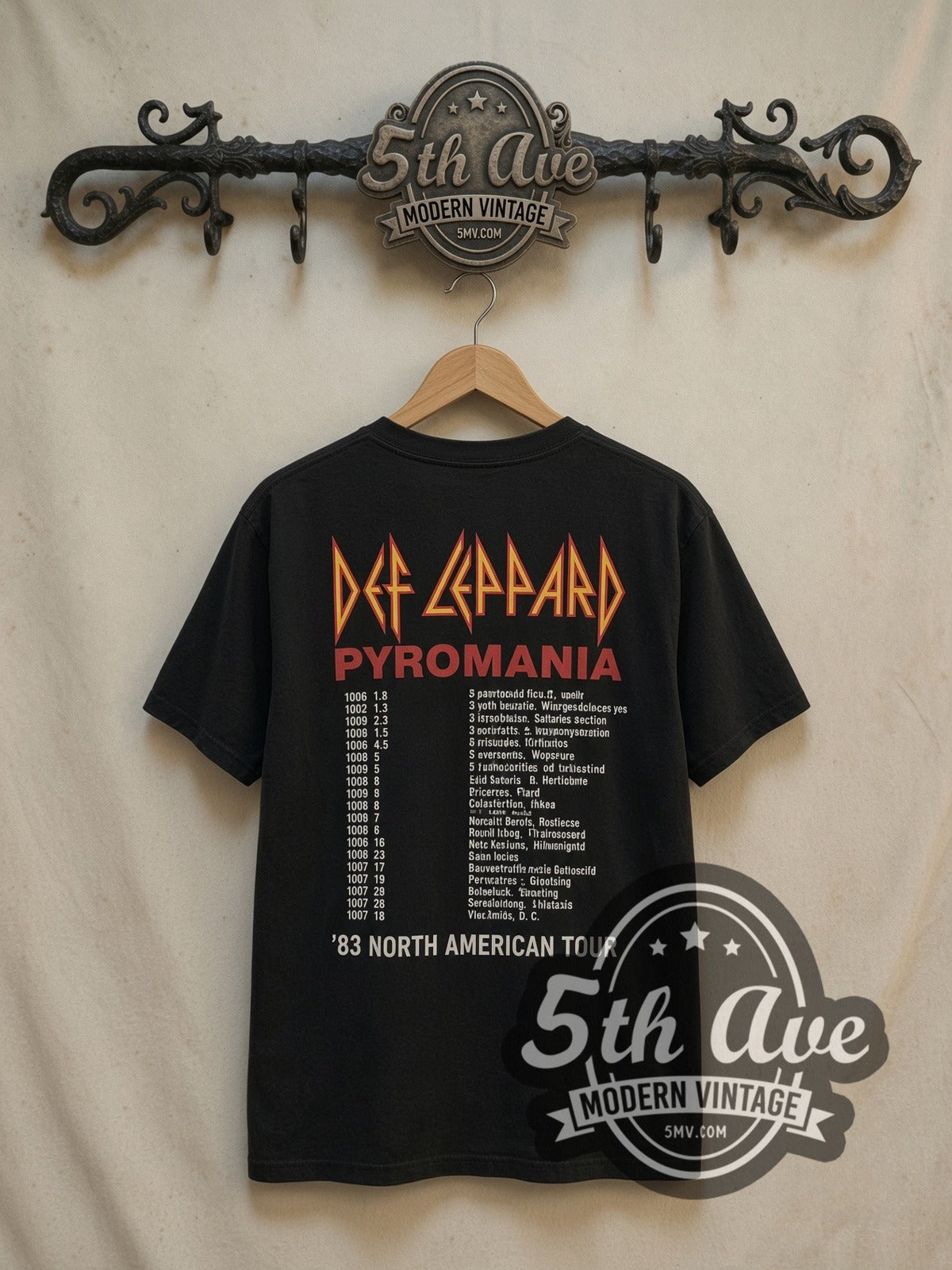 Def Leppard Too Late For Love Leopard Triangle vintage band t-shirt, back view on a display rack