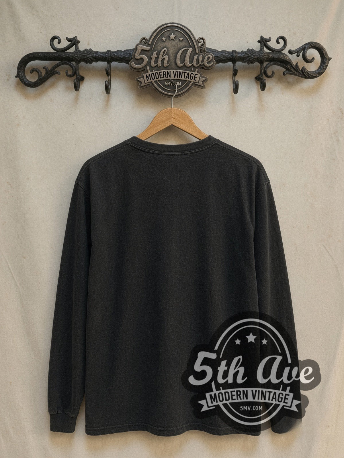 West Coast Choppers Skull Helmet / Maltese Cross Long Sleeve graphic tee, back view on a display rack